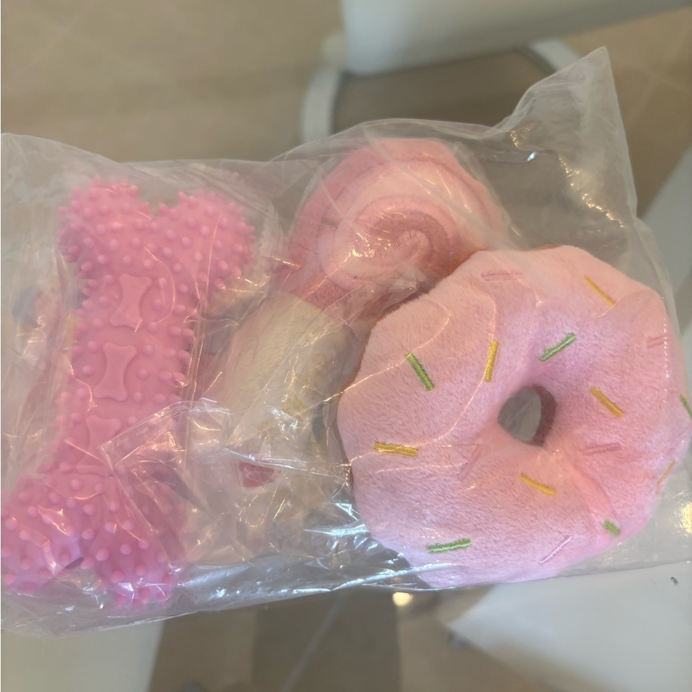 Pink Donut and Bone Toy Set Of 4 For Your Furry Legs . Brand New .